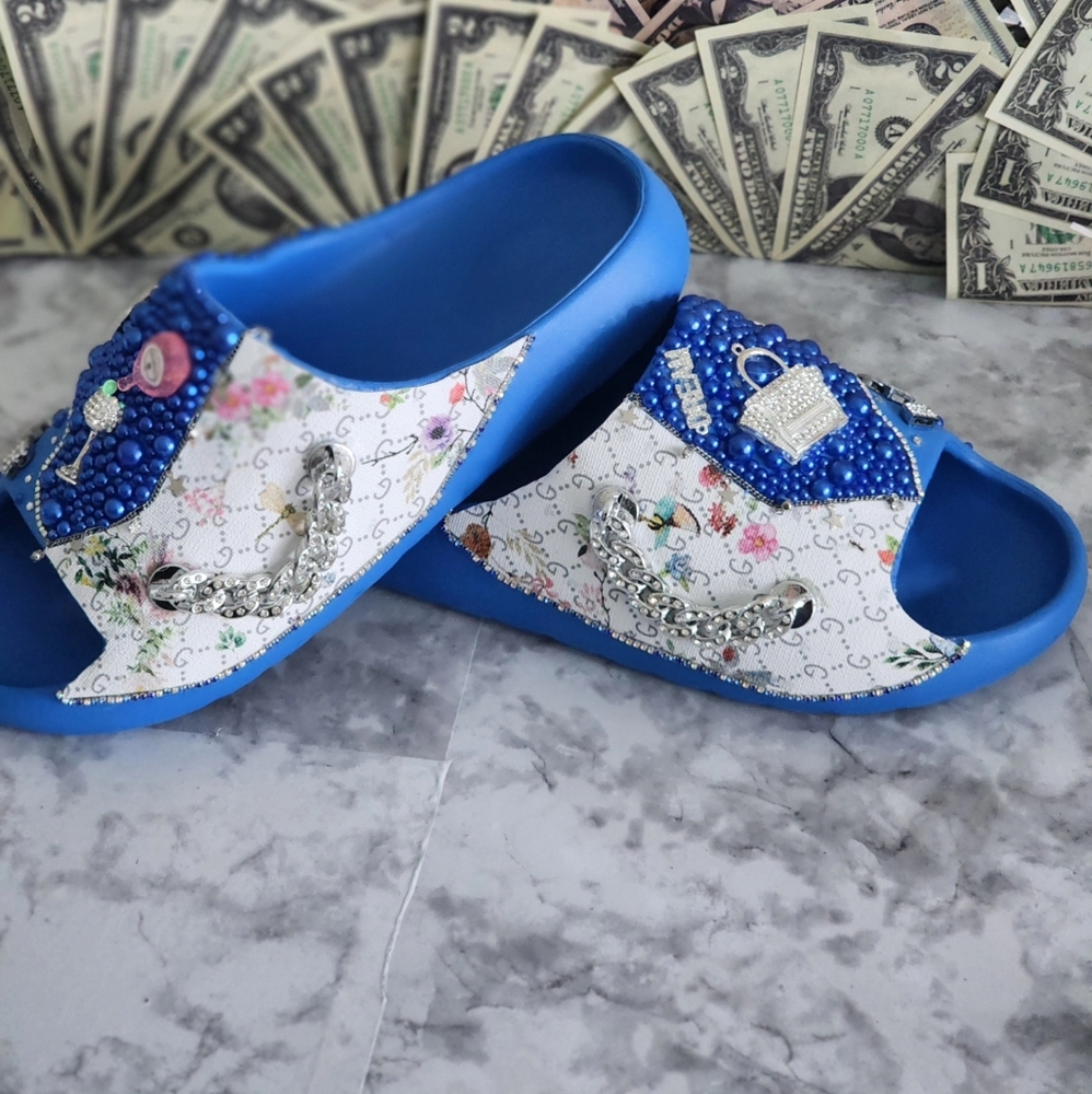 Ladies size 9.5 blue slides